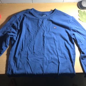 A blue long sleeve shirt